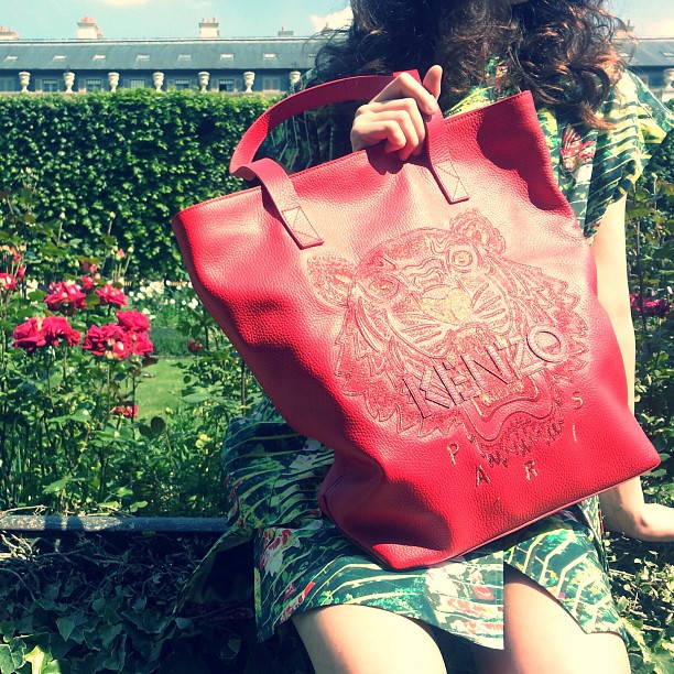 KENZO Out and about with the summer's must have The leather Tiger tote is available i